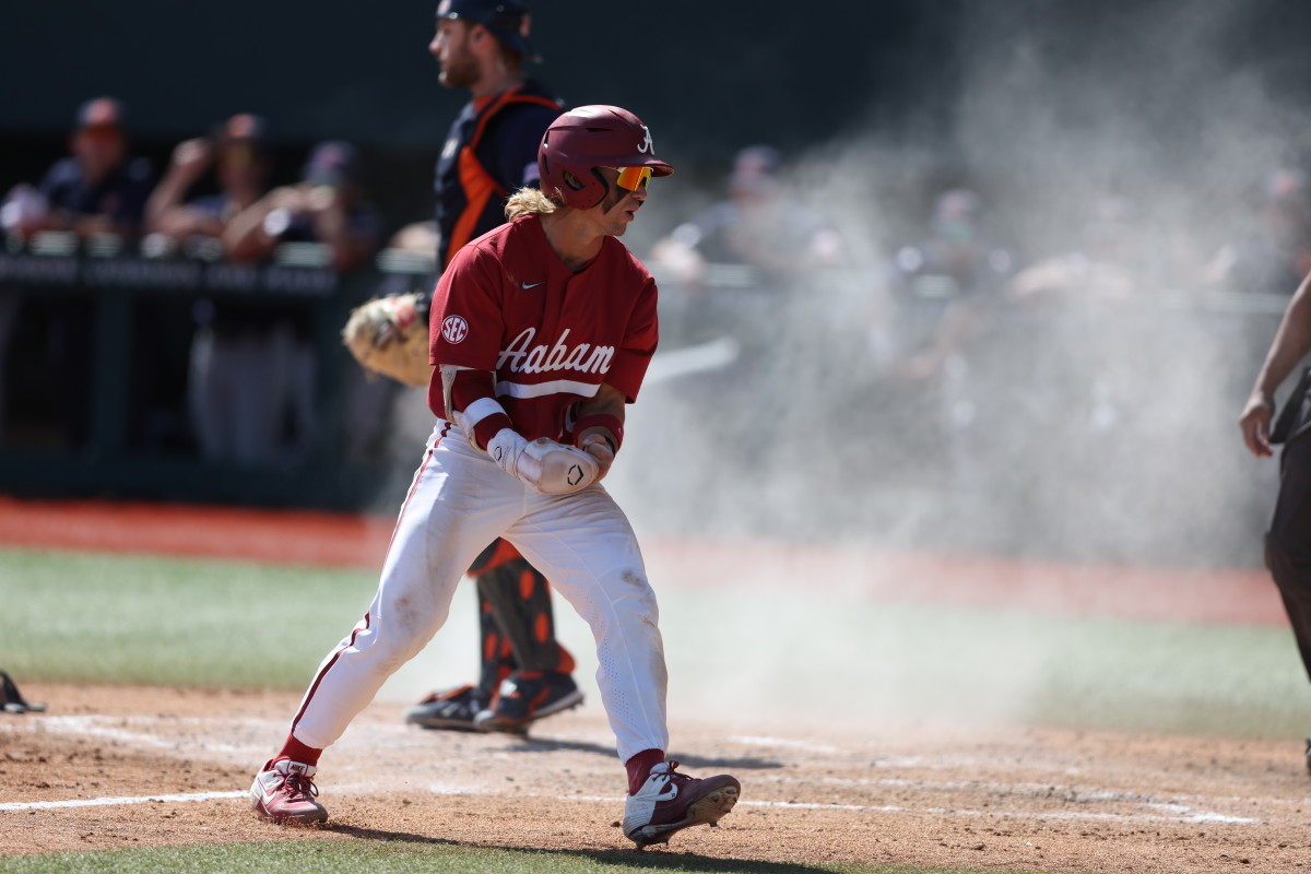 Alabama shortstop Jim Jarvis (10) after stealing home in the Crimson Tide's 6-1 win over the Auburn Tigers on April 16, 2023 at Sewell-Thomas Stadium in Tuscaloosa, Ala.