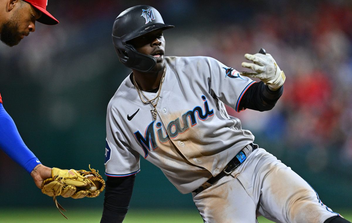 Miami Marlins outfielder Jazz Chisholm Jr. reacts after hitting an RBI triple against the Philadelphia Phillies. (2023)