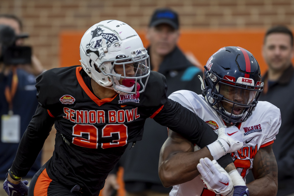 Feb 2, 2023; Mobile, AL, USA; American defensive back Julius Brents of Kansas State (23) defends against American wide receiver Jonathan Mingo of Ole Miss (18) practices during the third day of Senior Bowl week at Hancock Whitney Stadium in Mobile.