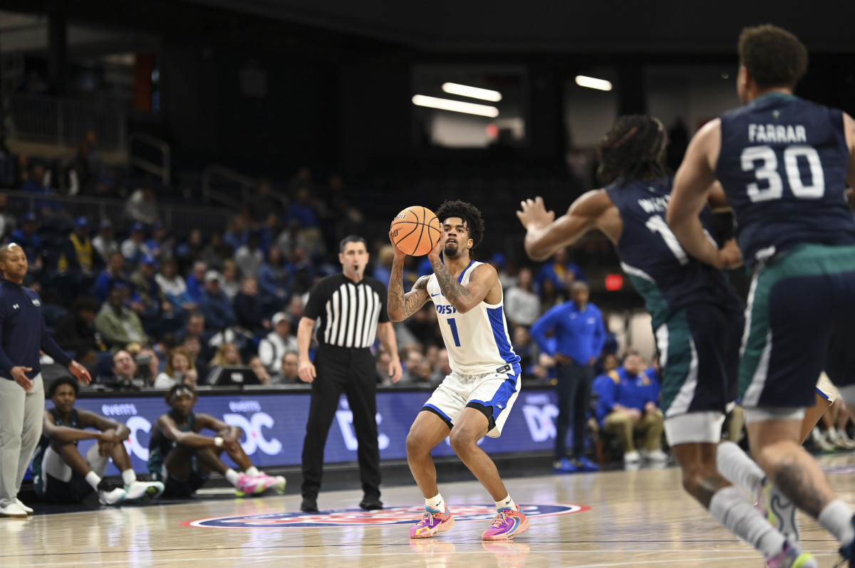 Mar 6, 2023; Washington, D.C., USA; Hofstra Pride guard Aaron Estrada (1) spots to to take a three point shot during the first half against the North Carolina-Wilmington Seahawks of CAA Tournament Semifinals at Entertainment & Sports Arena. Mandatory Credit: Tommy Gilligan-USA TODAY Sports