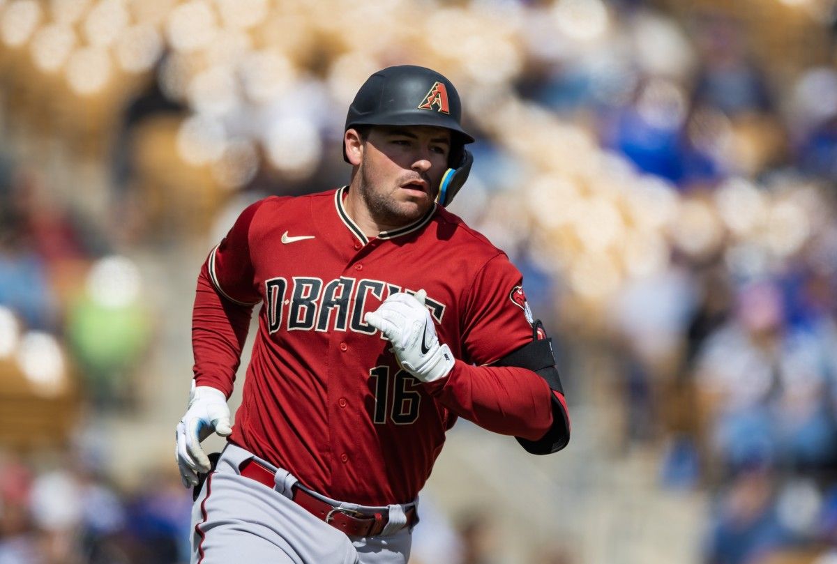 Diamondbacks infielder prospect Buddy Kennedy runs the bases in a Spring Training game against the Chicago White Sox at Camelback Ranch.