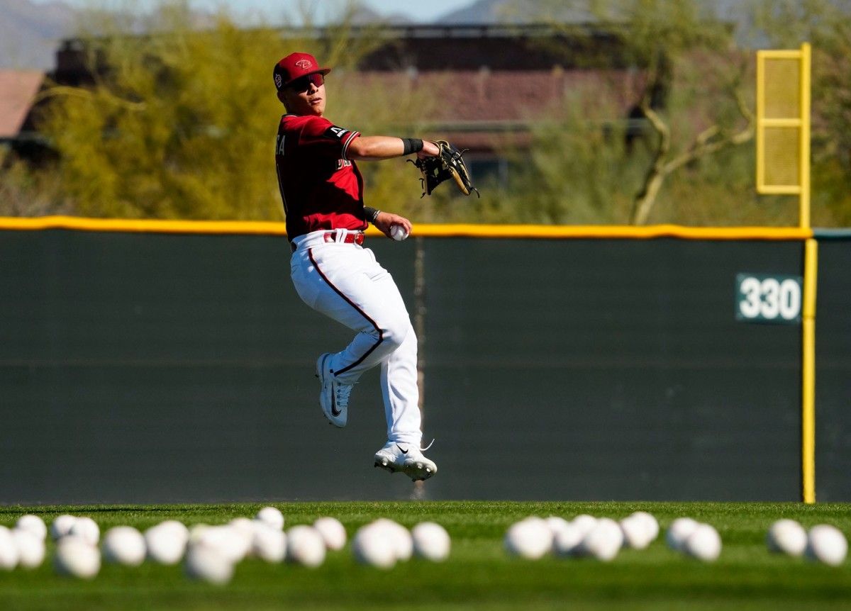 Jorge Barrosa does Spring Training outfield defensive drills at Salt River Fields.