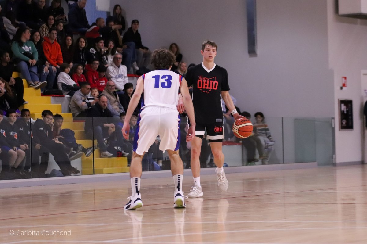 Gabe Cupps brings the ball up the court during Team Ohio's game against AP Galvi Lissone during the Junior International Tournament in Lissone, Italy.