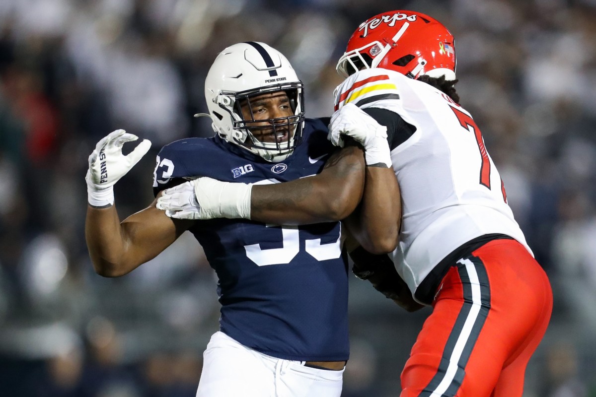 Nov 12, 2022; University Park, Pennsylvania, USA; Penn State Nittany Lions defensive end Dani Dennis-Sutton (33) tries to make his way passed Maryland Terrapins offensive linesman Jaelyn Duncan (71) during the third quarter at Beaver Stadium. Penn State defeated Maryland 30-0. Mandatory Credit: Matthew OHaren-USA TODAY Sports