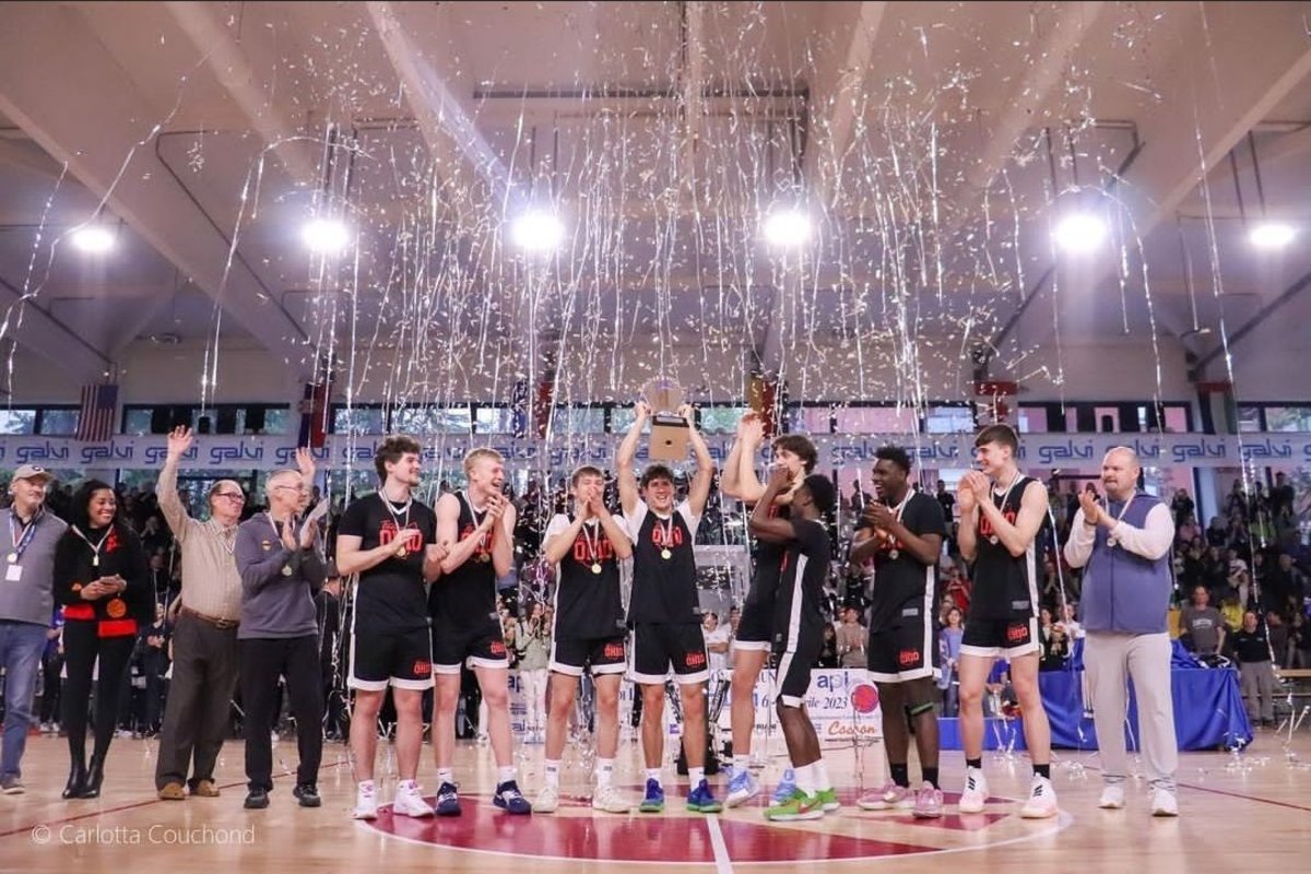 Reed Sheppard hoists the championship trophy for Team Ohio after winning the Junior International Tournament in Lissone, Italy. Coached by Brook Cupps, Team Ohio included Gabe Cupps, Dominique Aekins, Reed Sheppard, Colin White, Landon Vanderwarker, Matt Butler, Miles Heide and Sam Whitaker.