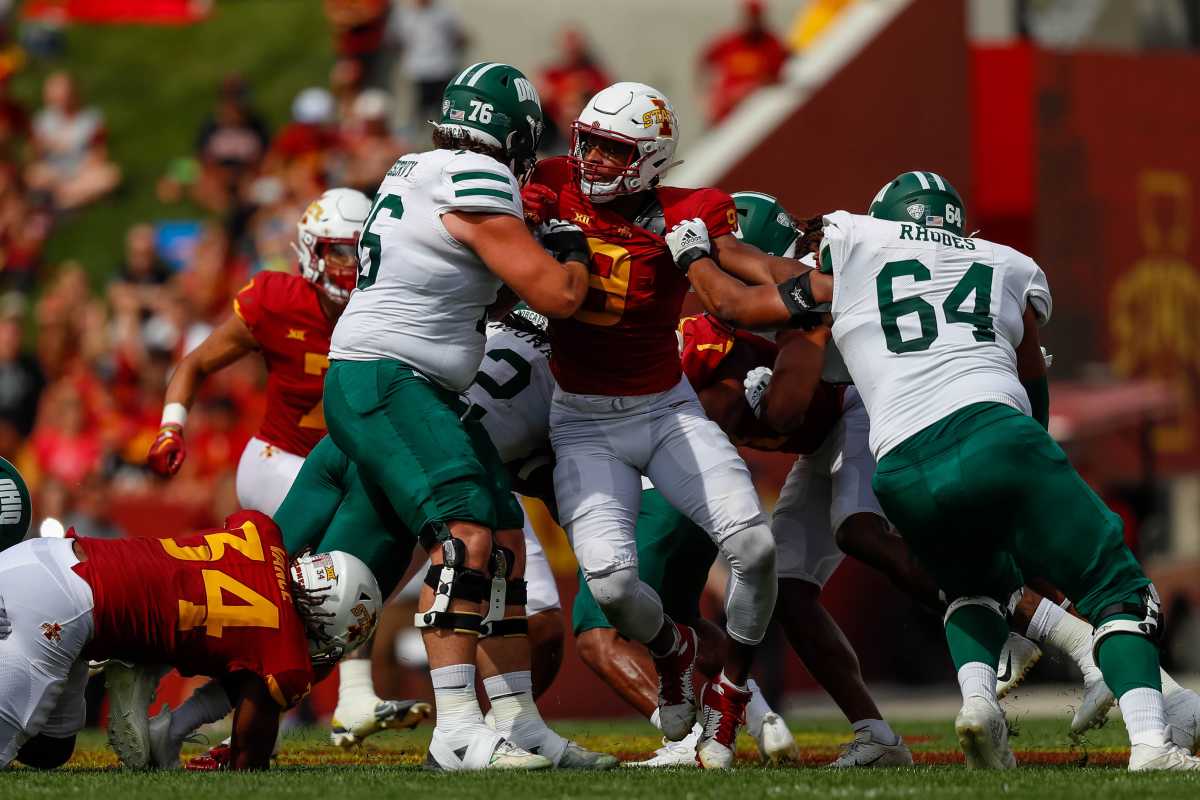 Iowa State defensive end Will McDonald IV (9) tries to get past Ohio offensive linemen Hagen Meservy (76) and Shedrick Rodes Jr. (64) during the game at Jack Trice Stadium in Ames, Iowa on Saturday, Sept. 17, 2022.