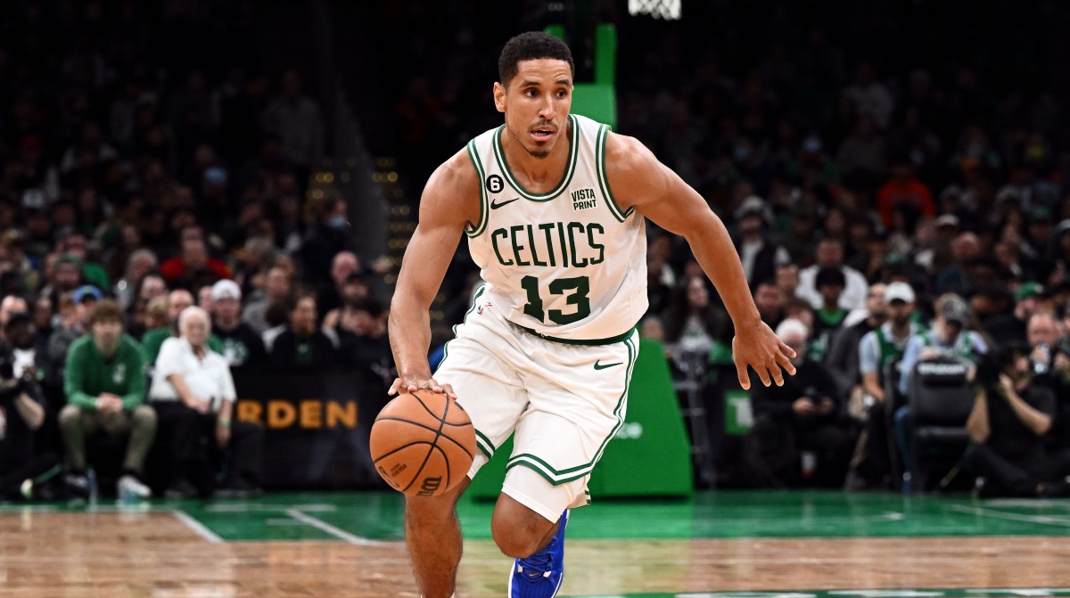 Boston Celtics guard Malcolm Brogdon (13) dribbles the ball during the second half of a game against the Toronto Raptors at the TD Garden.