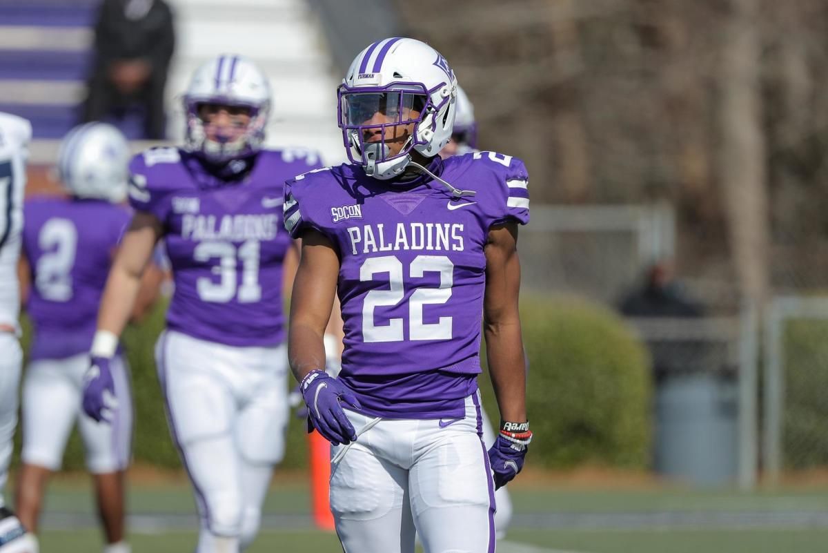 Ivan Yates warms up before a Furman football game.