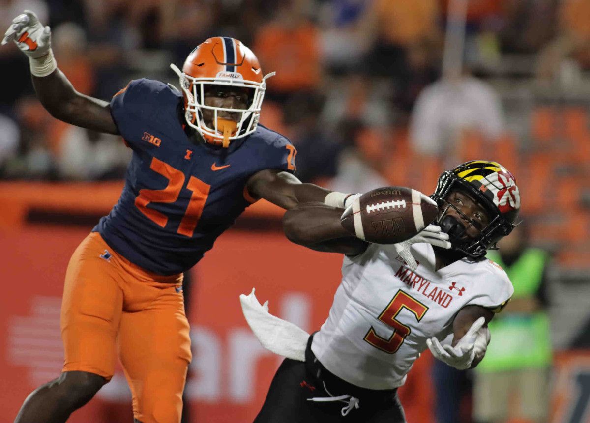 Jartavius Martin (21) deflects a pass intended for Maryland Terrapins wide receiver Rakim Jarrett (5)