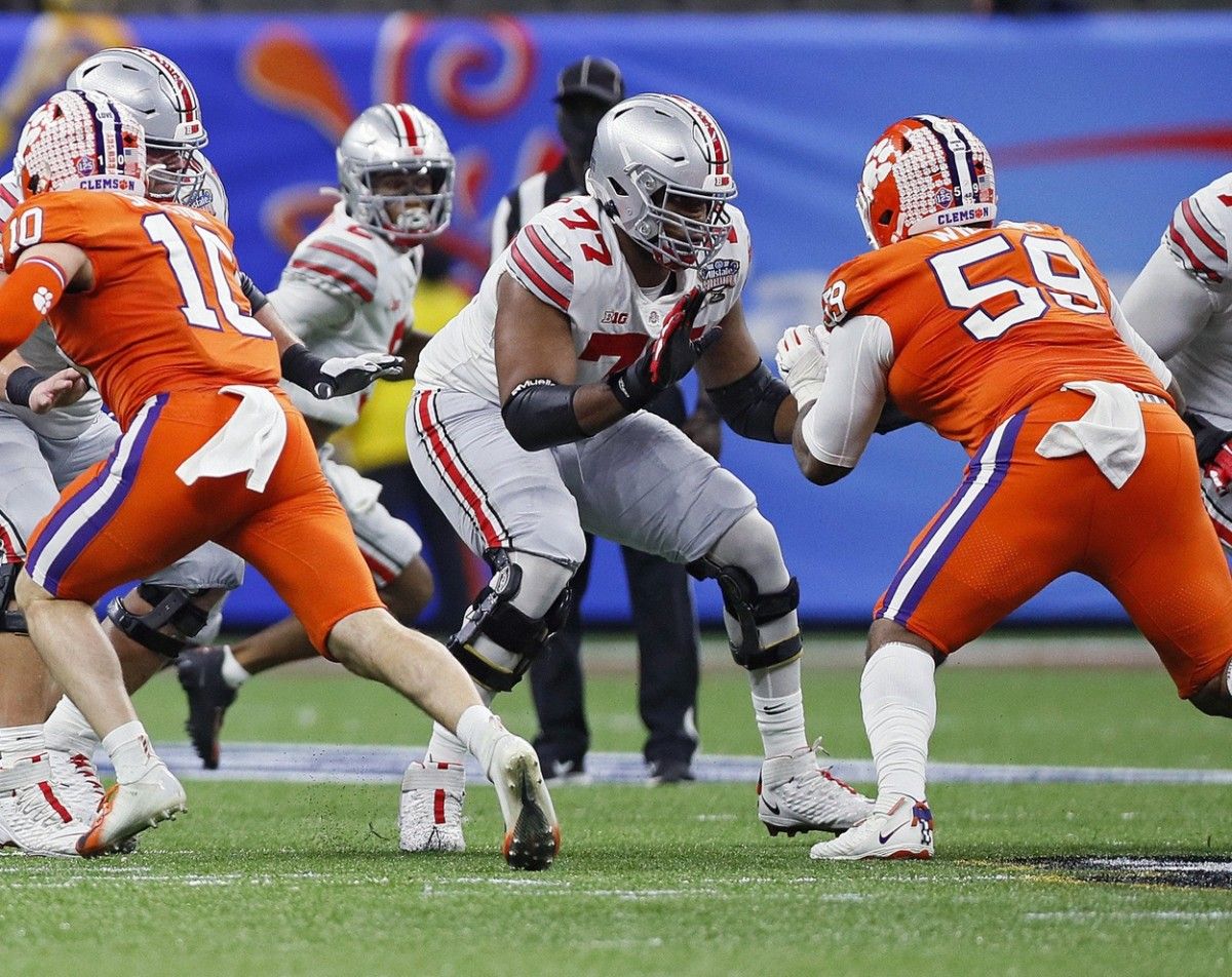 Ohio State Buckeyes offensive lineman Paris Johnson Jr. (77) blocks Clemson Tigers defensive tackle Jordan Williams (59) during the College Football Playoff semifinal at the Allstate Sugar Bowl in the Mercedes-Benz Superdome in New Orleans on Friday, Jan. 1, 2021. College Football Playoff Ohio State Faces Clemson In Sugar Bowl
