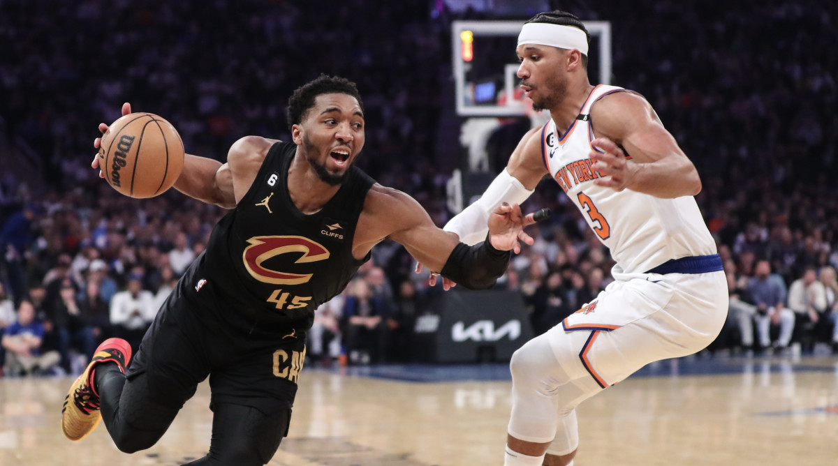 Cleveland Cavaliers guard Donovan Mitchell (45) looks to drive past New York Knicks guard Josh Hart (3) during game four of the 2023 NBA playoffs at Madison Square Garden.