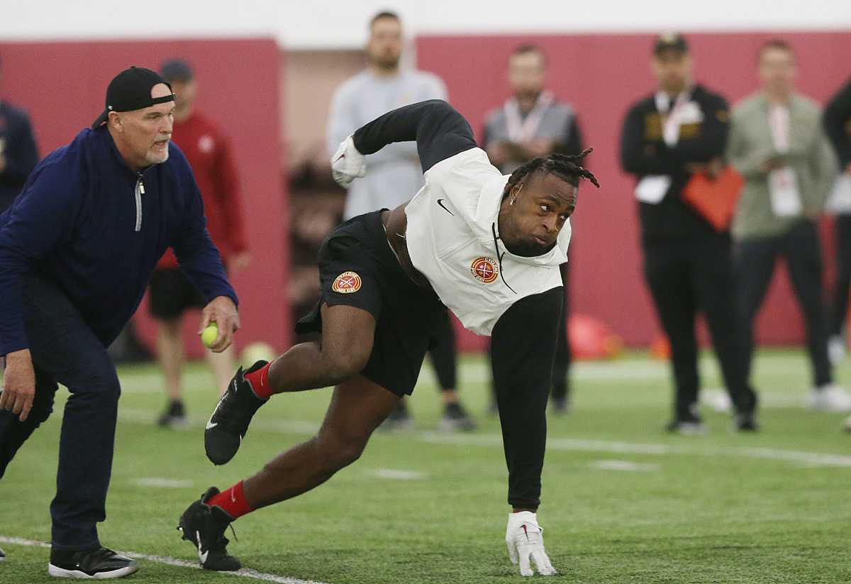 Former Iowa State defensive end Will McDonald finishes a run as NFL scouts watch during a drill in the university's football Pro-Day at the Bergstrom Indoor Football Complex Tuesday, March 21, 2023, in Ames, Iowa.