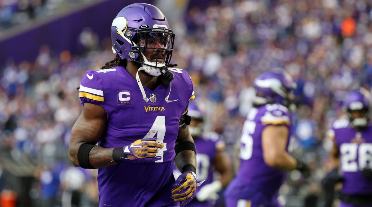 Vikings running back Dalvin Cook runs on the field during warmups.