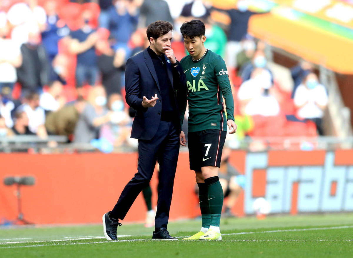 Tottenham interim manager Ryan Mason pictured (left) speaking to Son Heung-min during the 2021 EFL Cup final at Wembley