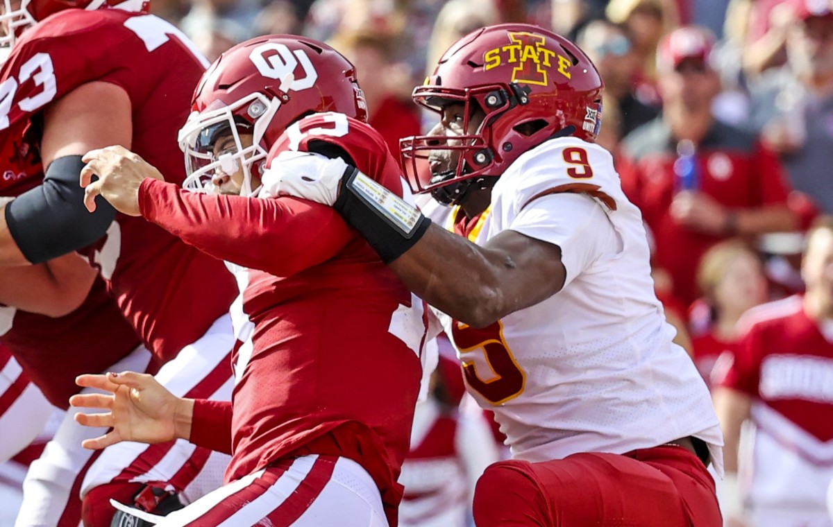Iowa State Cyclones defensive end Will McDonald IV (9) tackles Oklahoma Sooners quarterback Caleb Williams (13) during the second half at Gaylord Family-Oklahoma Memorial Stadium.