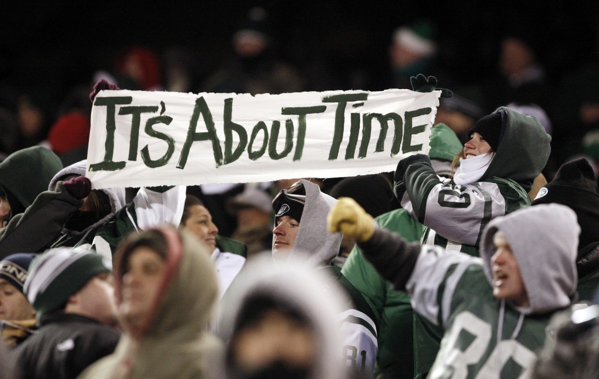 Jets' Fans hold up "It's About Time" sign in 2010