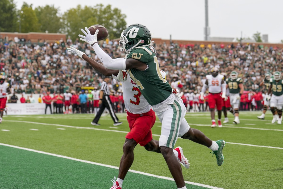 Sep 10, 2022; Charlotte, North Carolina, USA; Charlotte 49ers wide receiver Grant DuBose (14) makes a touchdown catch defended by Maryland Terrapins defensive back Deonte Banks (3) during the first quarter at Jerry Richardson Stadium. Mandatory Credit: Jim Dedmon-USA TODAY Sports