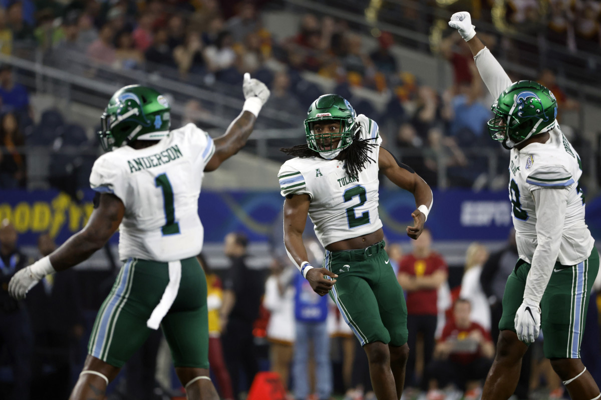 Jan 2, 2023; Arlington, Texas, USA; Tulane Green Wave linebacker Dorian Williams (2) reacts after a play against the USC Trojans in the first quarter in the 2023 Cotton Bowl at AT&T Stadium.