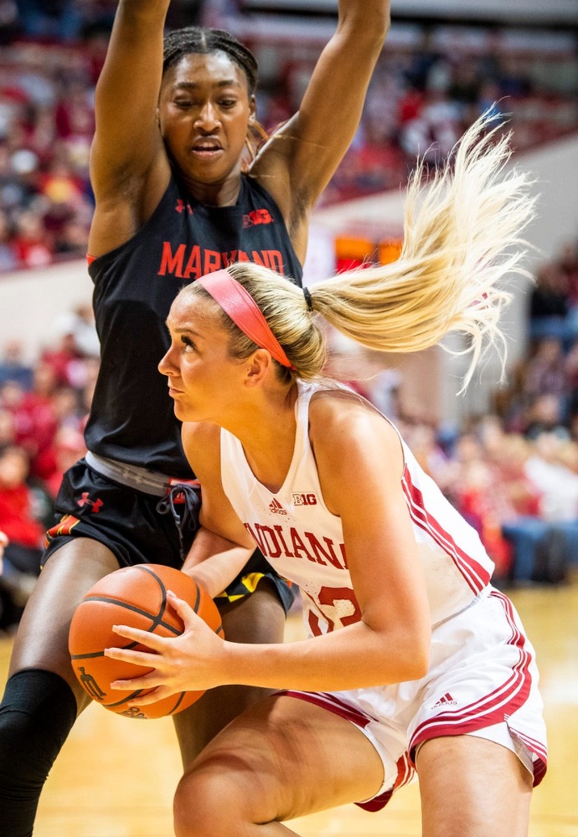 Indiana's Sydney Parrish (33) drives on Maryland's Diamond Miller (1) during the second half of the Indiana versus Maryland women's basketball game at Simon Skjodt Assembly Hall on Thursday, Jan. 12, 2023.