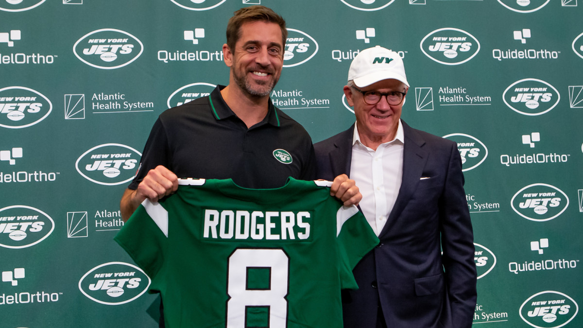 Aaron Rodgers meets the media along with Jets owner Woody Johnson during Rodgers's introductory news conference Wednesday at One Jets Drive.