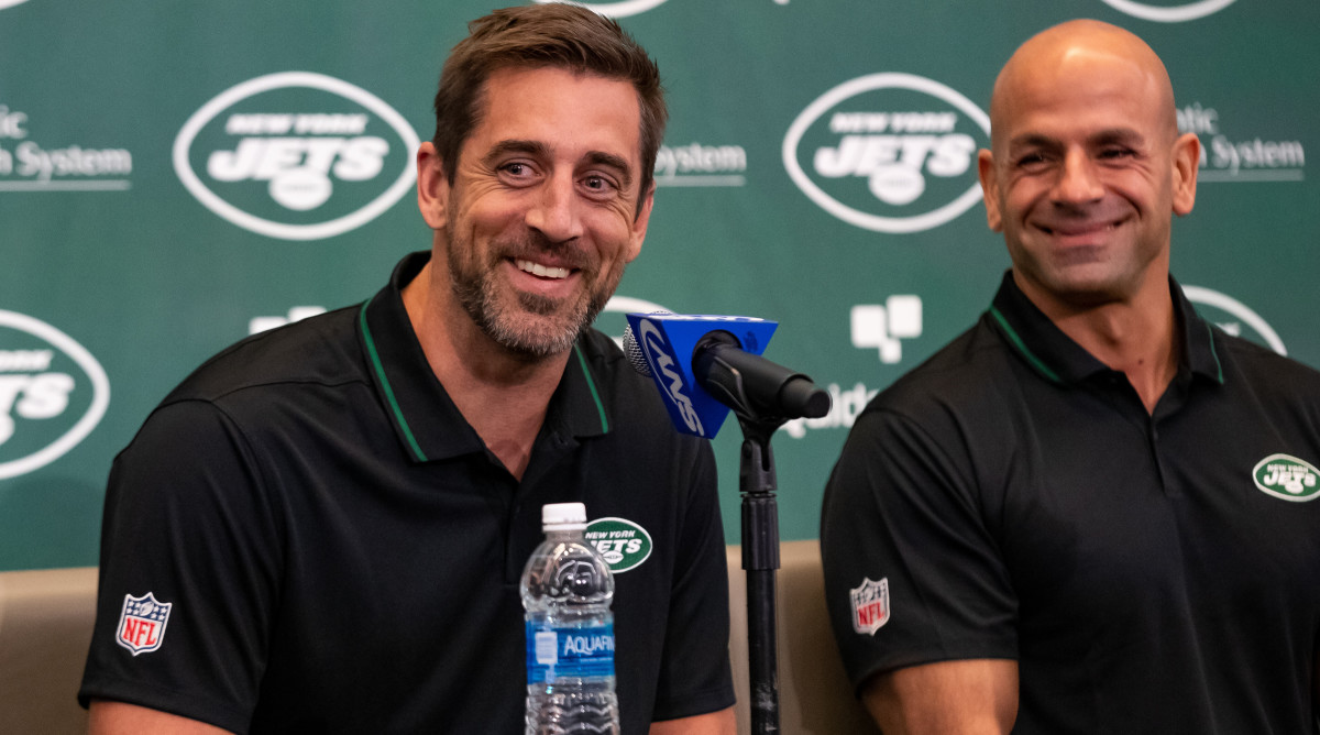 New Jets quarterback Aaron Rodgers with coach Robert Salah