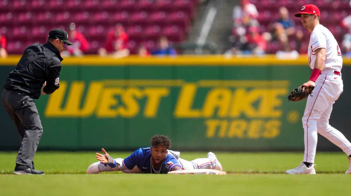 Rangers outfielder Ezequiel Duran reacts after being tagged out attempting to steal a base.