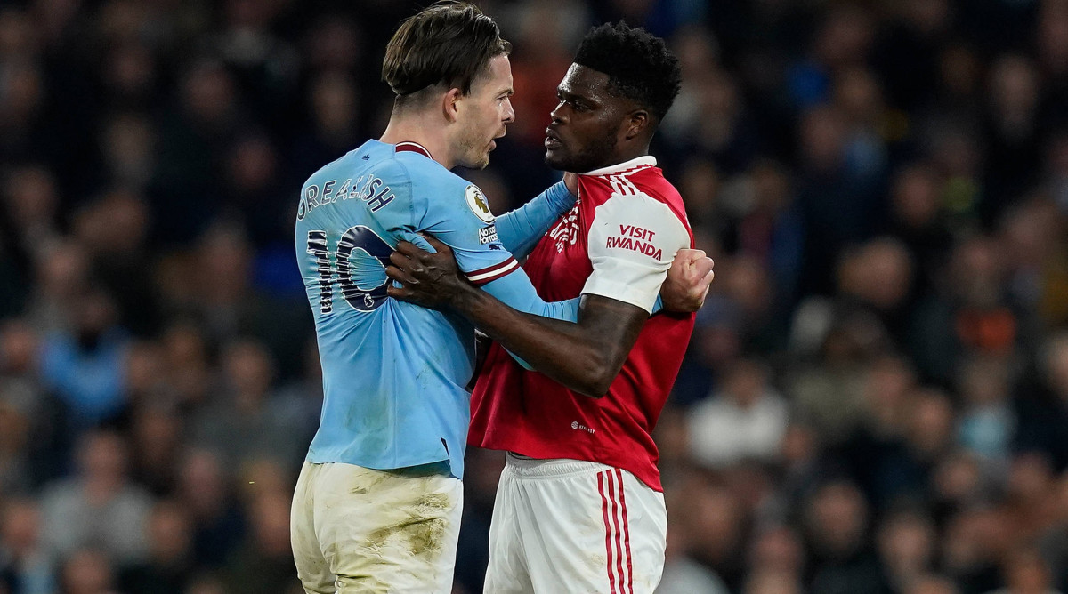 Jack Grealish and Thomas Partey fight.