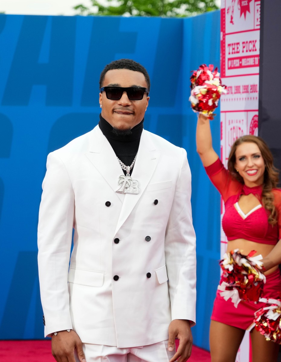 Alabama defensive back Brian Branch walks the NFL Draft Red Carpet before the first round of the 2023 NFL Draft at Union Station.