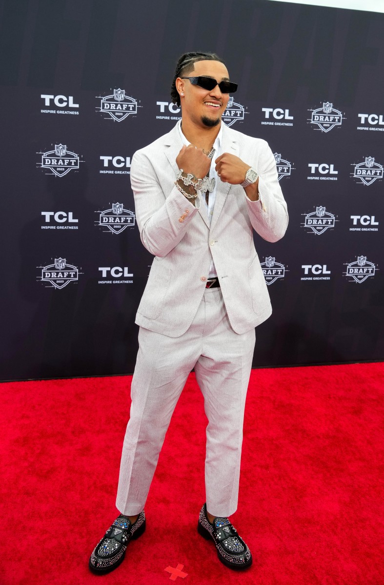 Ohio State wide receiver Jaxon Smith-Njigba poses for a photo on the NFL Draft Red Carpet before the first round of the 2023 NFL Draft at Union Station.