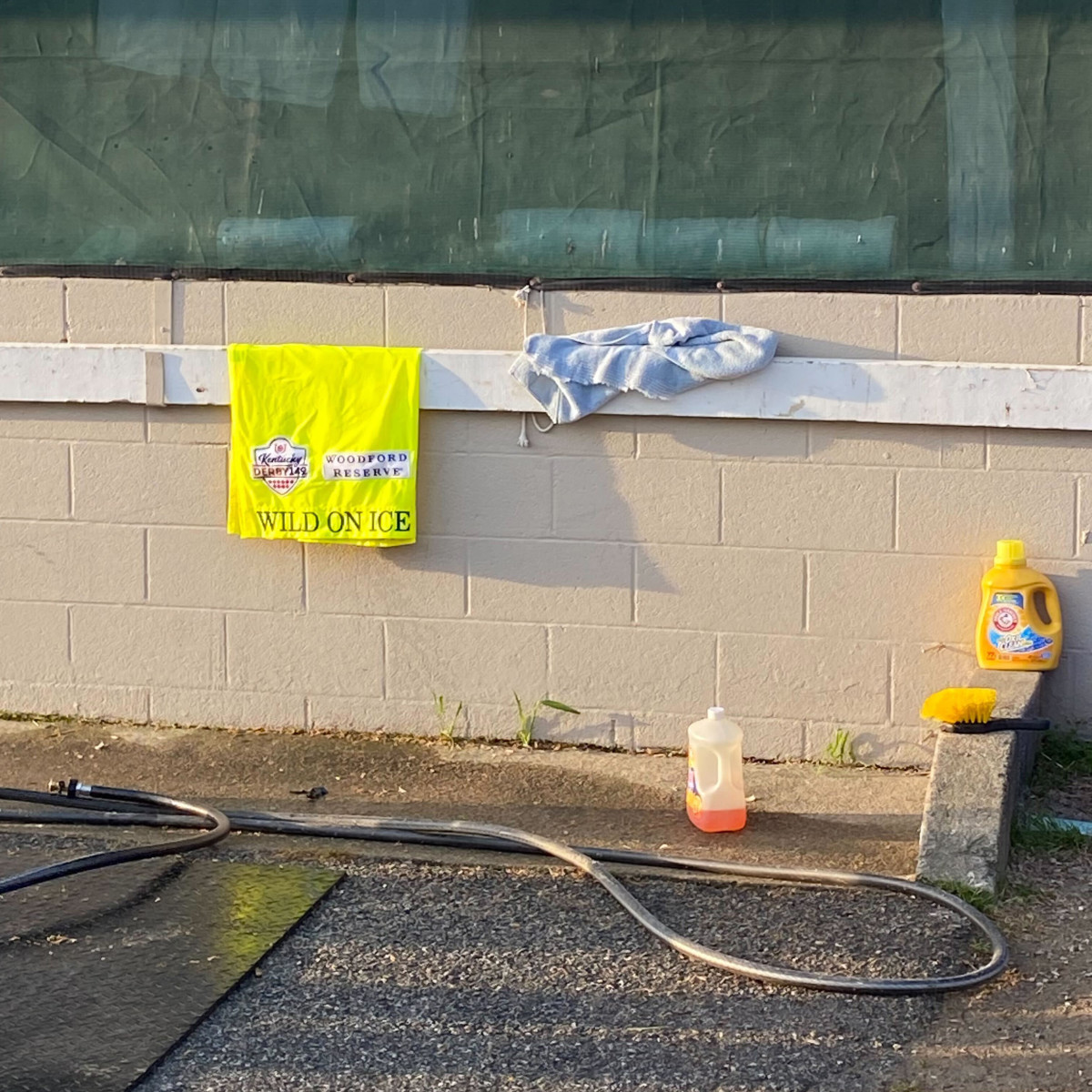 A bright yellow saddle cloth for Wild On Ice sits in the Churchill Downs stable after the horse had to be euthanized ahead of the Kentucky Derby.
