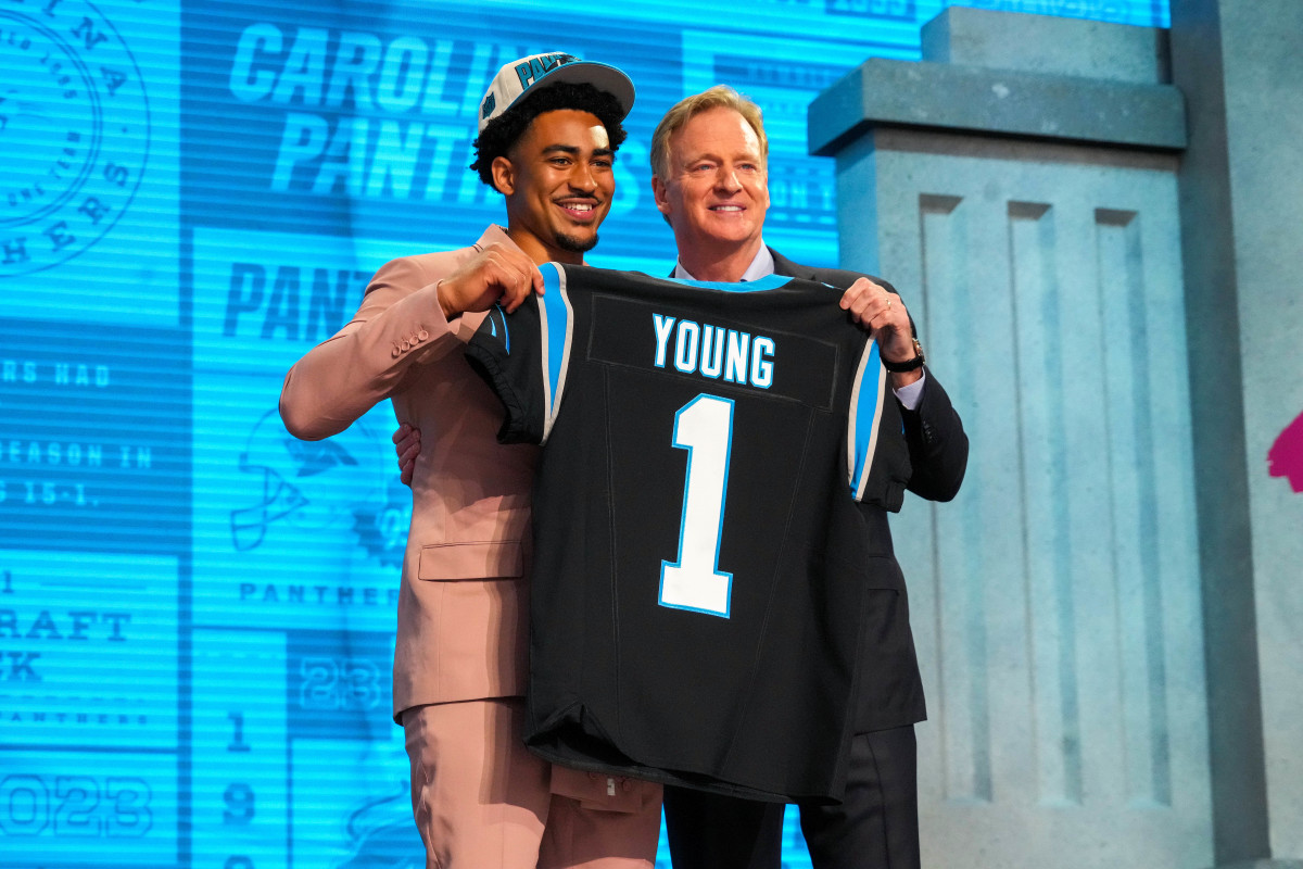 Apr 27, 2023; Kansas City, MO, USA; Alabama quarterback Bryce Young with NFL commissioner Roger Goodell after he was drafted first overall by the Carolina Panthers in the first round of the 2023 NFL Draft at Union Station.