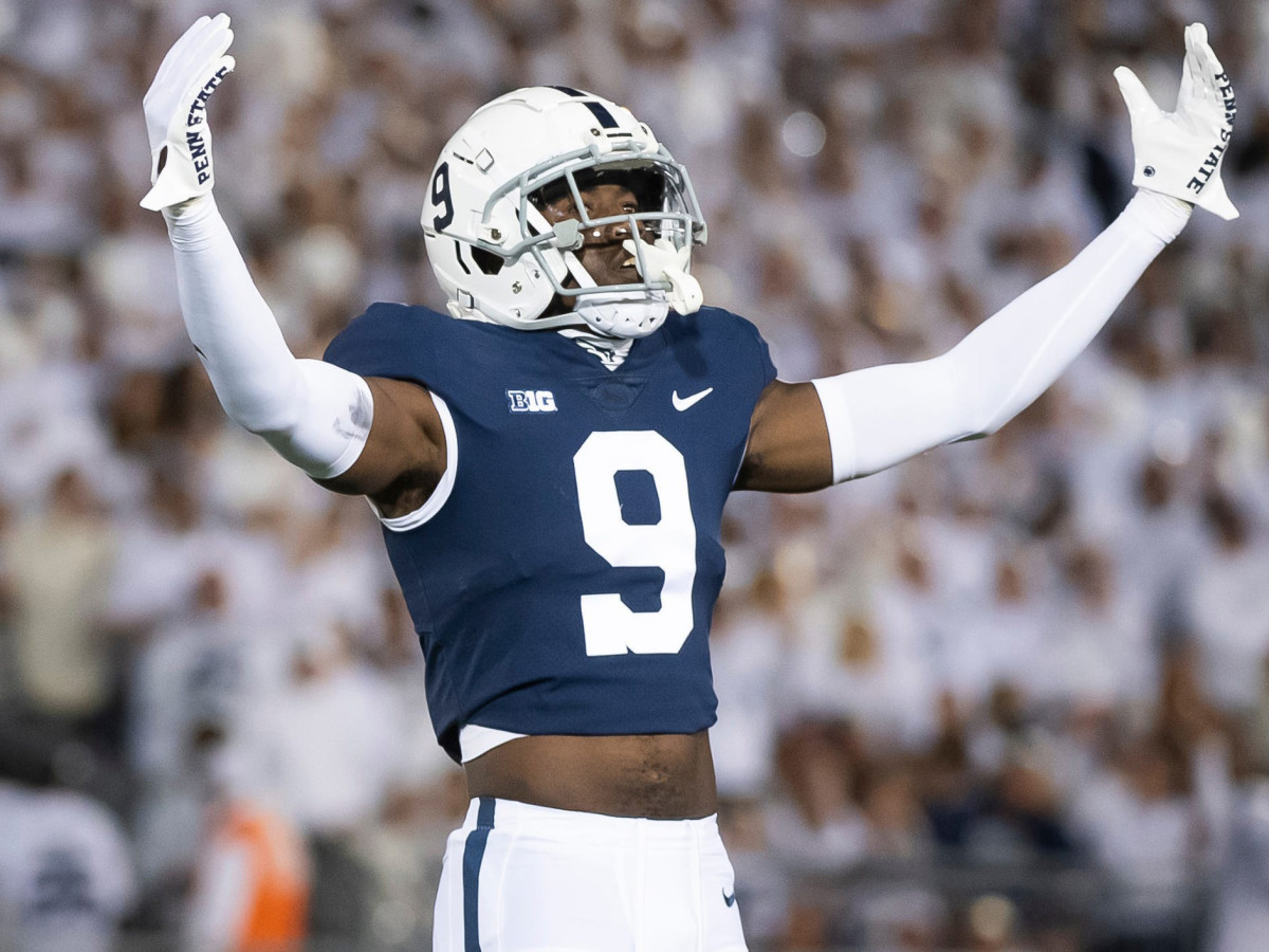 Penn State’s Joey Porter Jr. motions to Nittany Lion fans after Minnesota is penalized for a second false start.