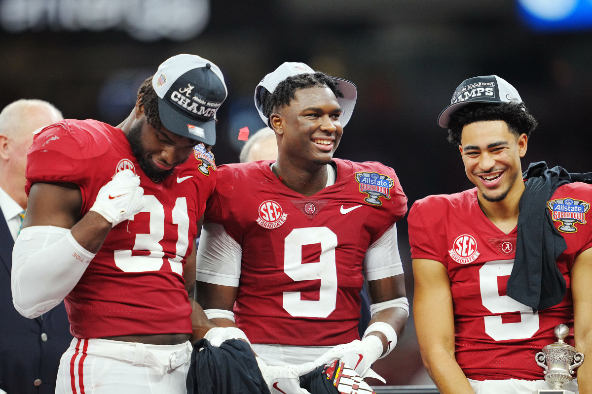 Dec 31, 2022; New Orleans, LA, USA; Alabama Crimson Tide linebacker Will Anderson Jr. (31) defensive back Jordan Battle (9) and quarterback Bryce Young (9) celebrate the victory against the Kansas State Wildcats in the 2022 Sugar Bowl at Caesars Superdome. Mandatory Credit: Andrew Wevers-USA TODAY Sports