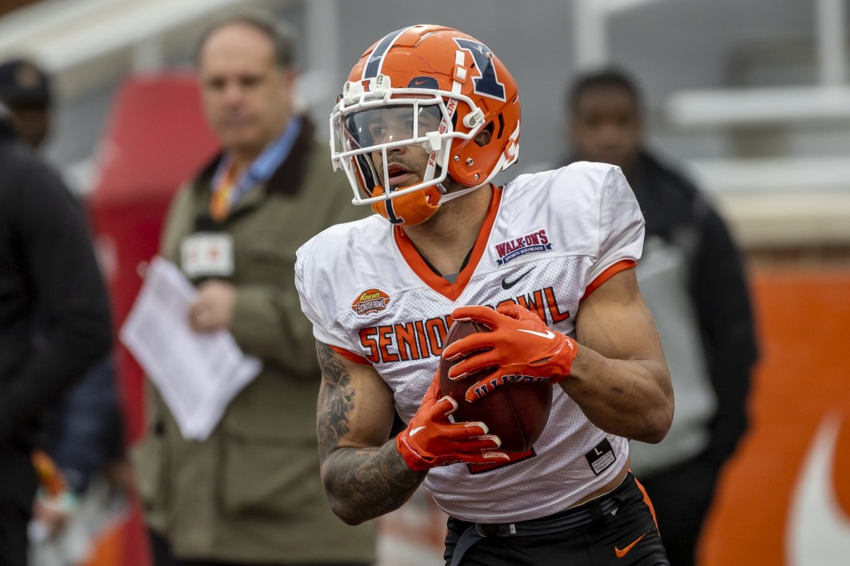 Feb 2, 2023; Mobile, AL, USA; National running back Chase Brown of Illinois (2) practices during the third day of Senior Bowl week at Hancock Whitney Stadium in Mobile. Mandatory Credit: Vasha Hunt-USA TODAY Sports