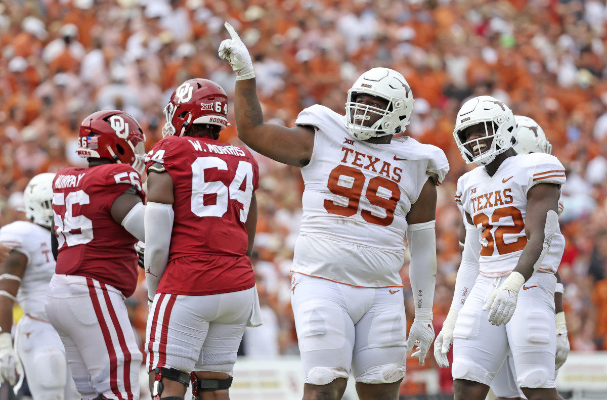 Oct 8, 2022; Dallas, Texas, USA; Texas Longhorns defensive lineman Keondre Coburn (99) reacts during the second half against the Oklahoma Sooners at the Cotton Bowl. Mandatory Credit: Kevin Jairaj-USA TODAY Sports