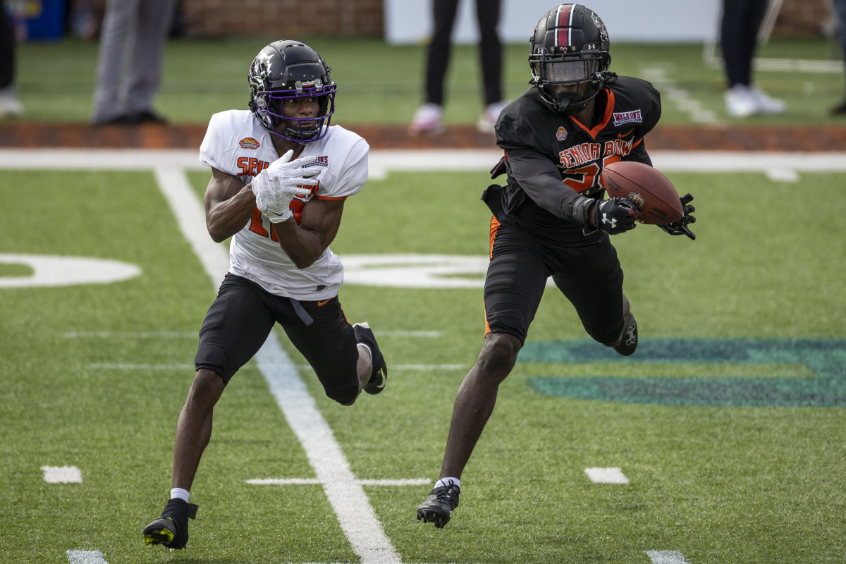 Feb 1, 2023; Mobile, AL, USA; American defensive back Darius Rush of South Carolina (28) breaks up a pass to American wide receiver Derius Davis of TCU (12) practices during the second day of Senior Bowl week at Hancock Whitney Stadium in Mobile. Mandatory Credit: Vasha Hunt-USA TODAY Sports