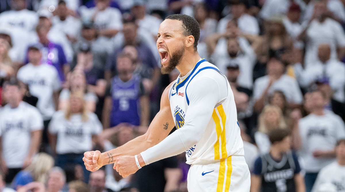 Golden State Warriors guard Stephen Curry (30) celebrates against the Sacramento Kings.
