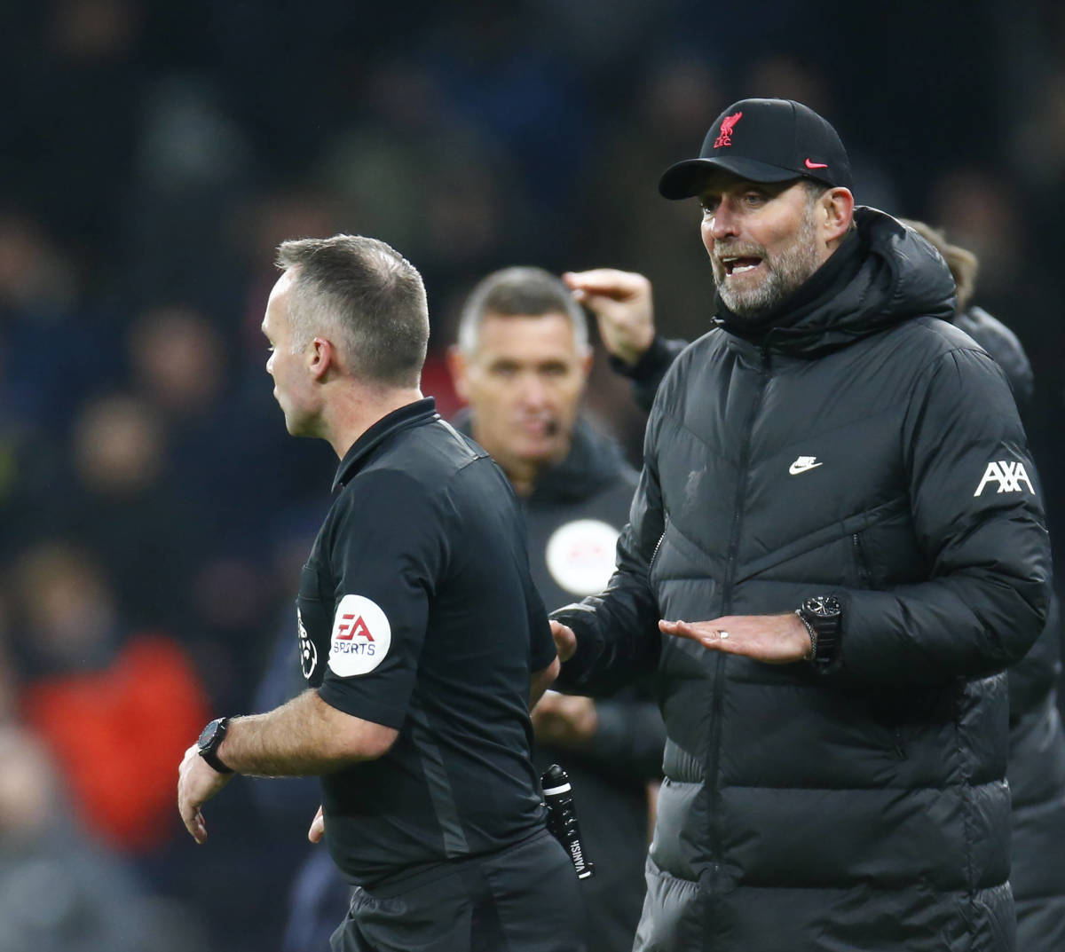 Liverpool manager Jurgen Klopp pictured (right) complaining to referee Paul Tierney after a game at Tottenham in December 2021