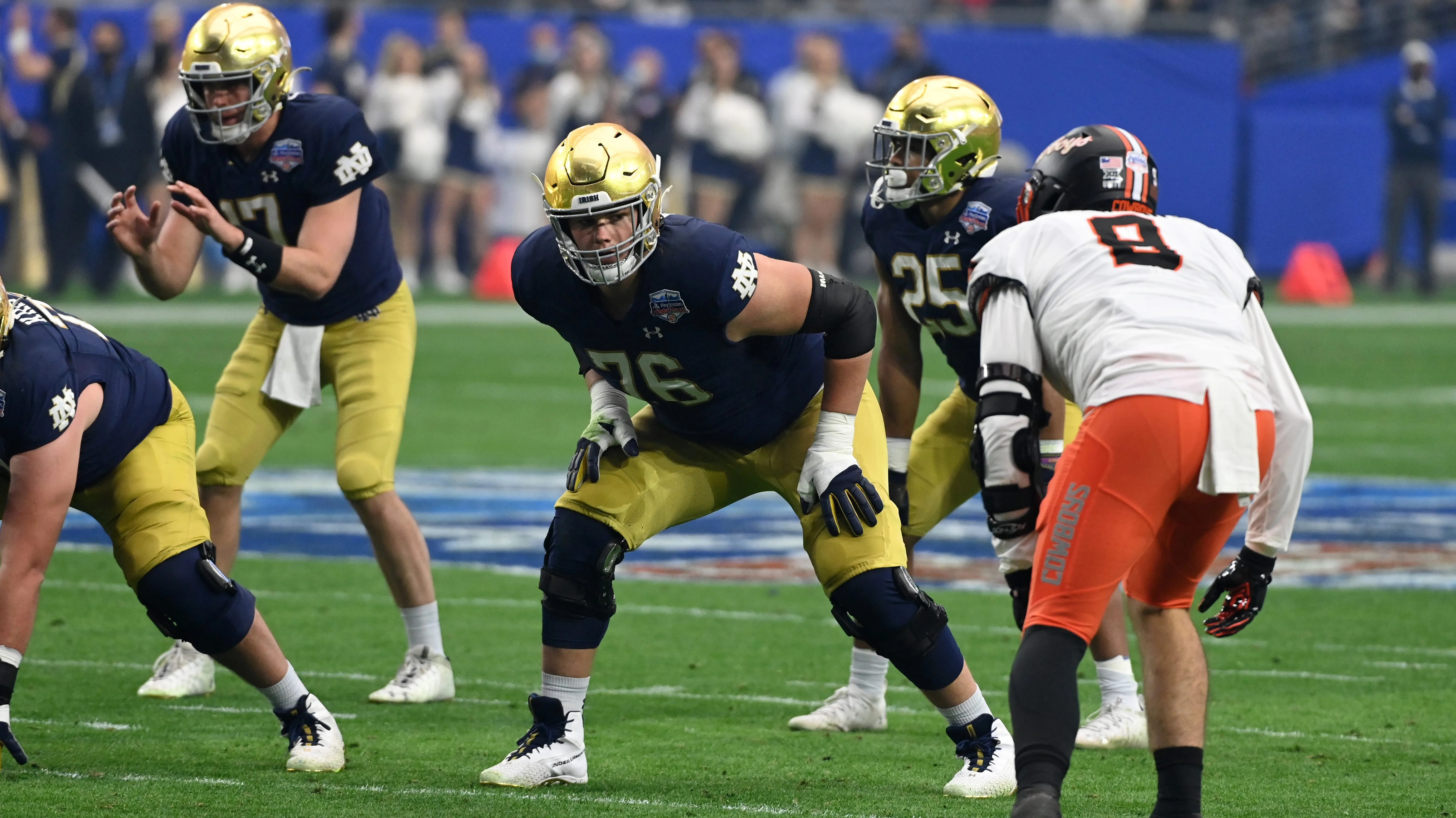 Joe Alt (76) playing left tackle for Notre Dame in the Fiesta Bowl in 2023.