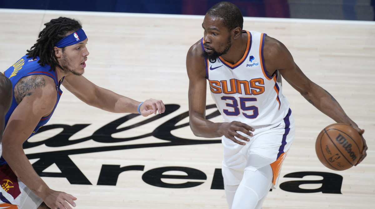 Kevin Durant playing against the Nuggets.