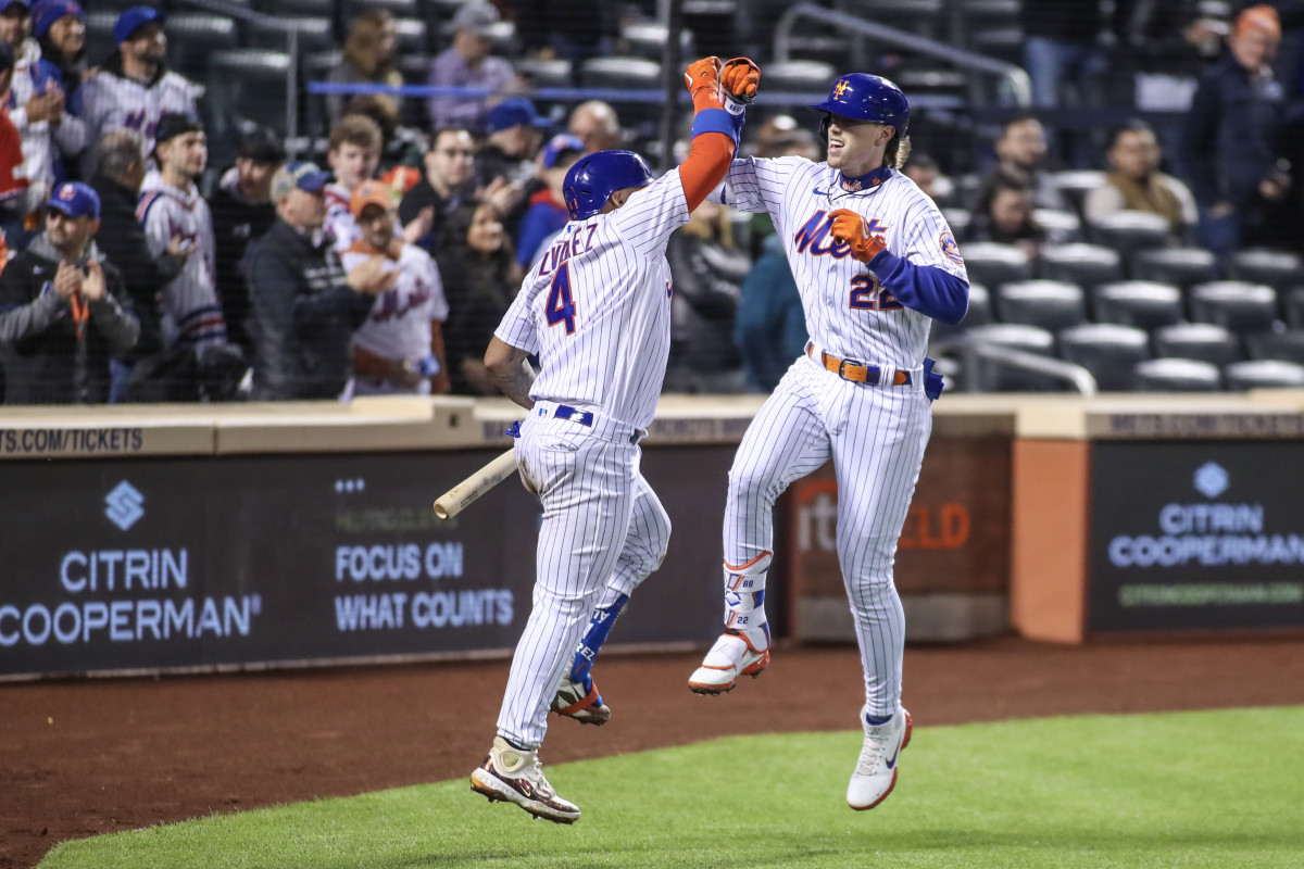 Apr 27, 2023; New York City, New York, USA; New York Mets third baseman Brett Baty (22) celebrates with catcher Francisco Alvarez (4) after hitting a home run in the fourth inning against the Washington Nationals at Citi Field.