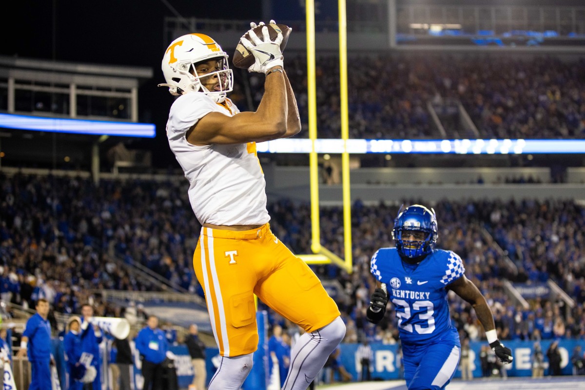 Nov 6, 2021; Lexington, Kentucky, USA; Tennessee Volunteers wide receiver Cedric Tillman (4) catches a pass in the end zone putting the Tennessee Volunteers ahead of the Kentucky Wildcats 44-35 during the fourth quarter at Kroger Field. Mandatory Credit: Jordan Prather-USA TODAY Sports