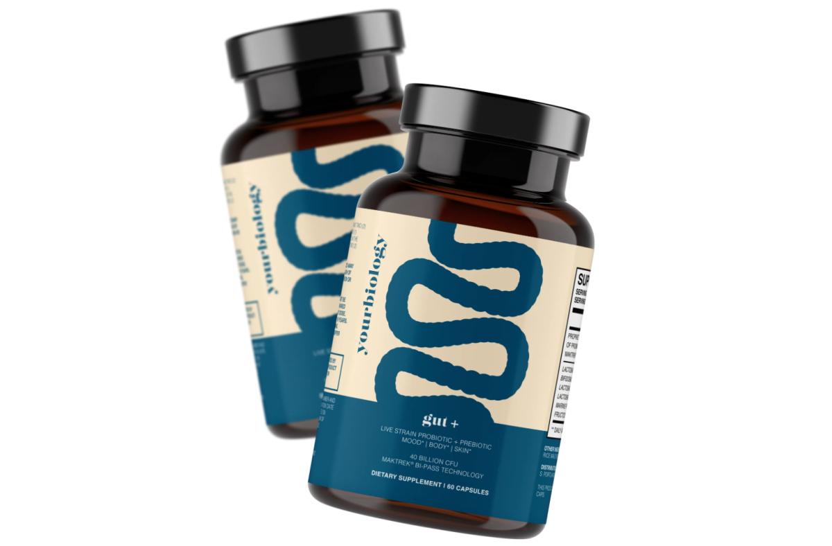 Two bottles of YourBiology Probiotic Gut+ probiotic supplement against a white background.