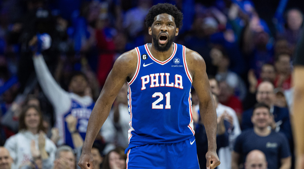 76ers center Joel Embiid reacts after a score against the Brooklyn Nets.