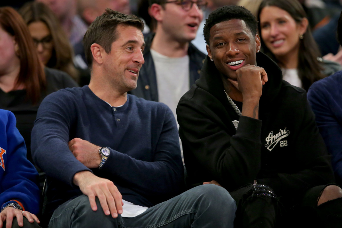 Jets' players Aaron Rodgers and Sauce Gardner at Madison Square Garden for the Knicks' 2023 NBA Eastern Conference semifinal Gane 2