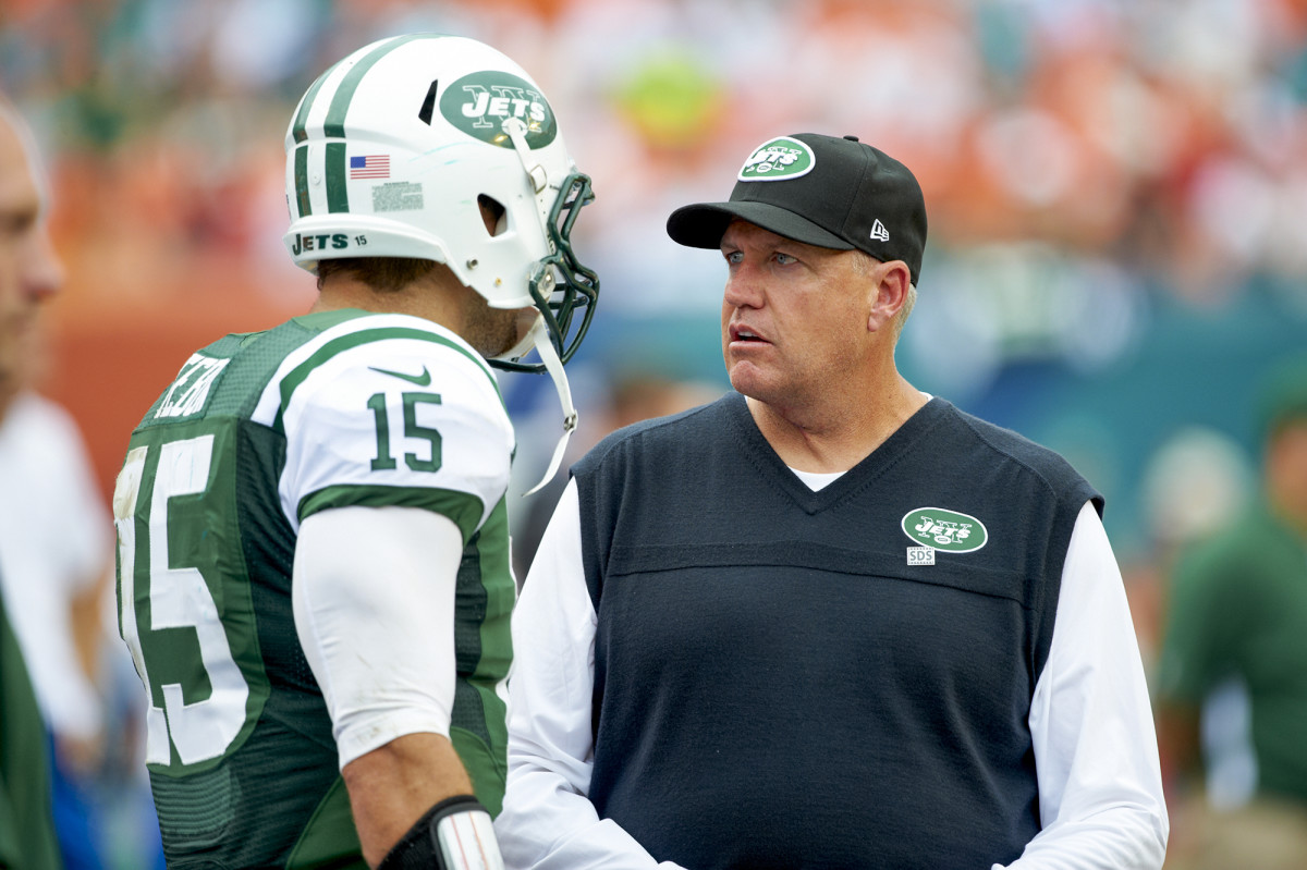 Rex Ryan talking to Tim Tebow during their Jets days