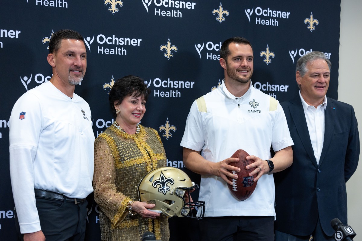 Mar 11, 2023; New Orleans Saints head coach Dennis Allen, chief executive officer Gayle Benson, quarterback Derek Carr, and general manager Mickey Loomis. Mandatory Credit: Stephen Lew-USA TODAY Sports
