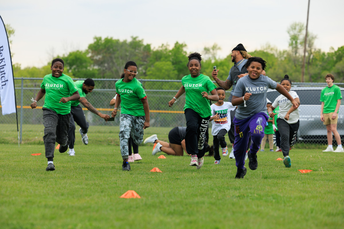 Washington Commanders DE Chase Young runs around with kids from the Boys and Girls Club of Kansas City, Thornberry Thursday, April 28. Young's appearance marked the first community event of its kind for Klutch Athletics with Good Sports. (Photo provided by New Balance)