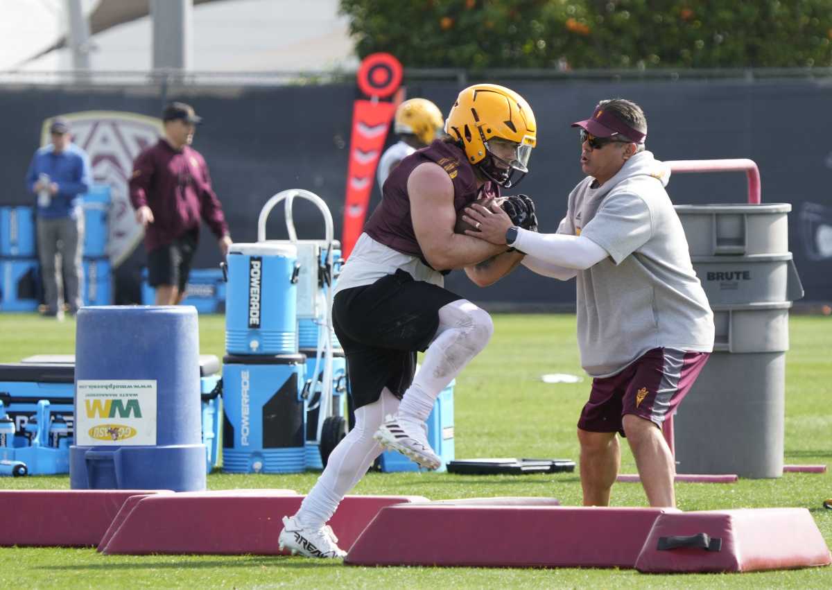 Arizona State Sun Devils' Cameron Skattebo trains with assistant running backs coach Shaun Aguano during spring football practice at the Kajikawa practice fields in Tempe on March 16, 2023. Ncaa Football Asu Spring Football Practice