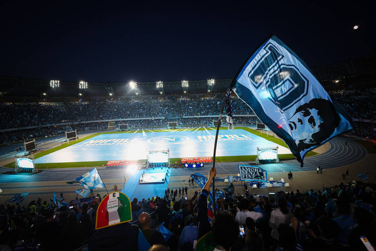 Fans pictured at the Diego Armando Maradona Stadium watching on giant screens as Napoli's 1-1 draw at Udinese sealed the 2022/23 Serie A title